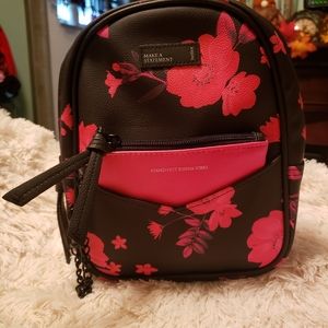 Justice pink/black mini  backpack. New never used.